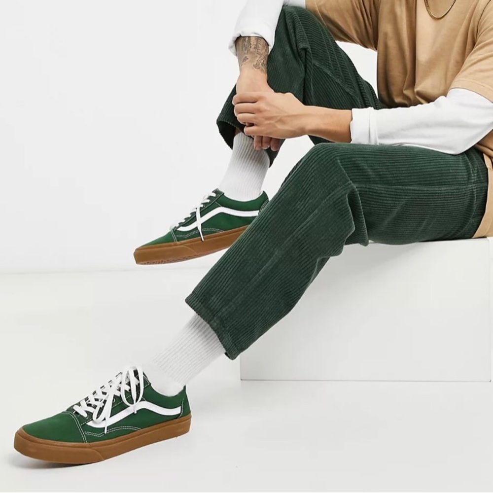 ASOS DESIGN relaxed tapered corduroy jeans in dark green